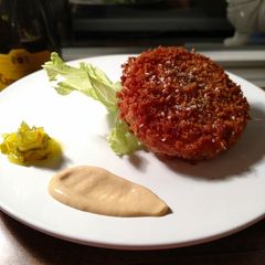 A picture of Fried Tomato "Burgers".