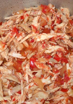 Una foto de Pollo reciclado con tomate