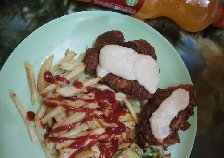 Fries and chicken gaucamole and gravy