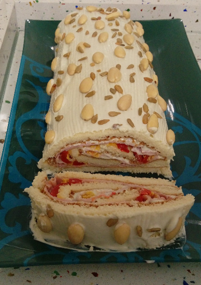 Una foto de Rulo de lacón, roquefort y frutos secos
