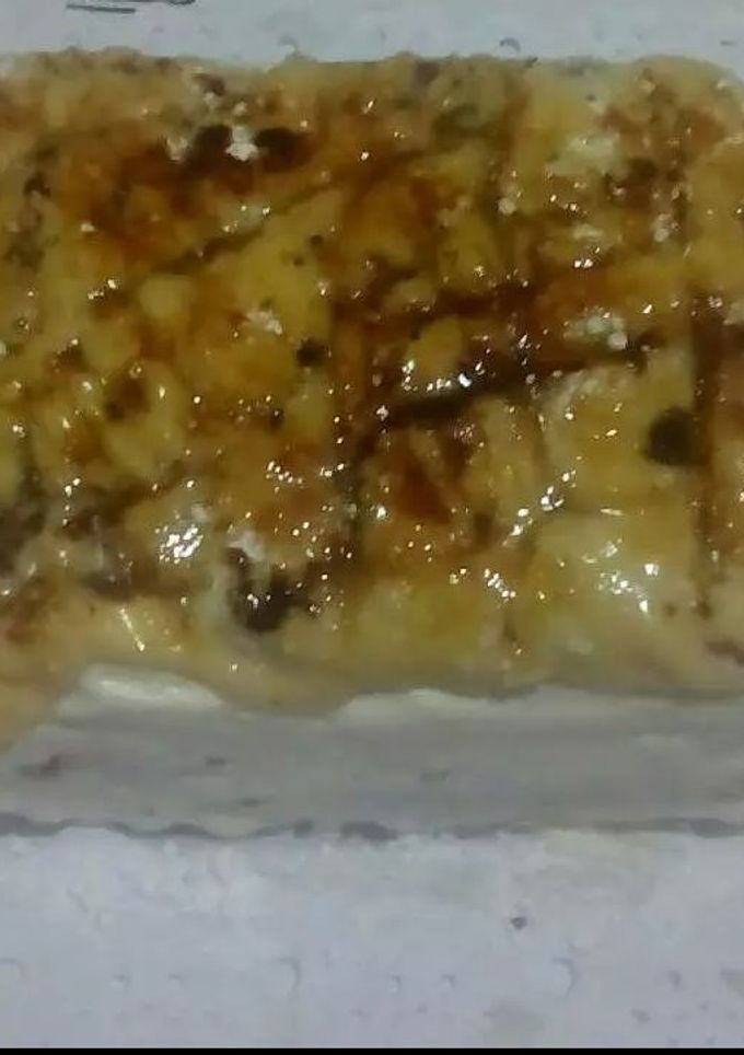 Una foto de Tiramisú con crema catalana