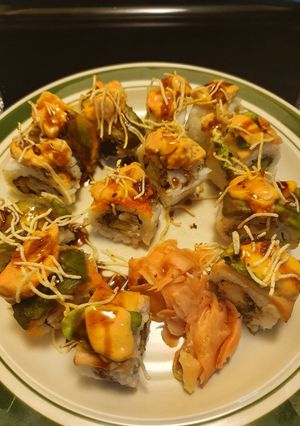 A picture of Sushi, a Delight 🍣 Served with Surimi Salad.