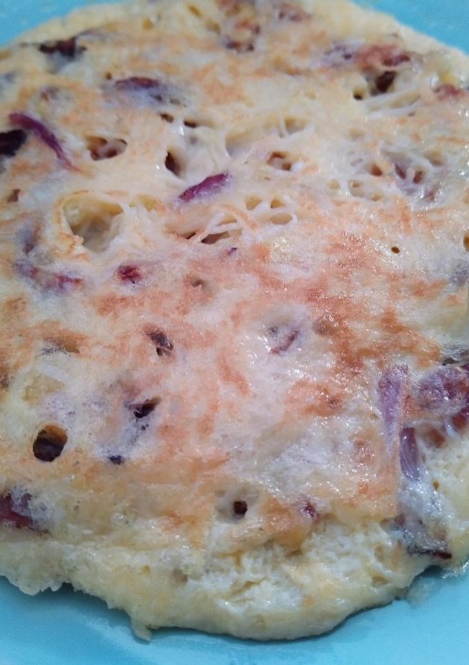 Una foto de Tortillita con patata, cebolla y queso