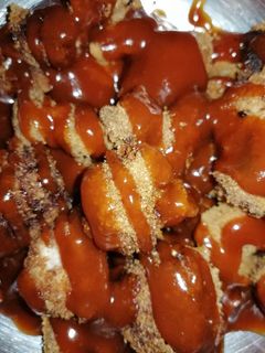 Una foto de Costillas fritas con salsa barbacoa