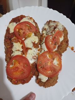 Una foto de Milanesa de Berenjena Napolitana Riquísima