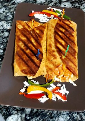 A picture of Tandoori chicken wraps.