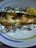 Spigola con Limone, Olio di Oliva Extravergine e Aglio al Forno