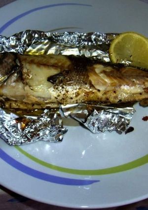 Foto di Spigola con Limone, Olio di Oliva Extravergine e Aglio al Forno