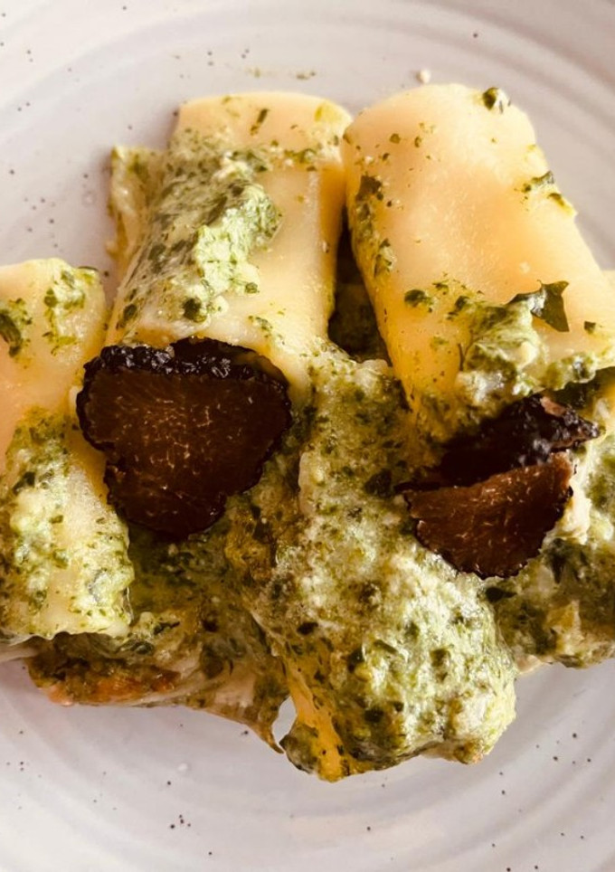 Una foto de Paccheri con ricotta, espinaca y langosta