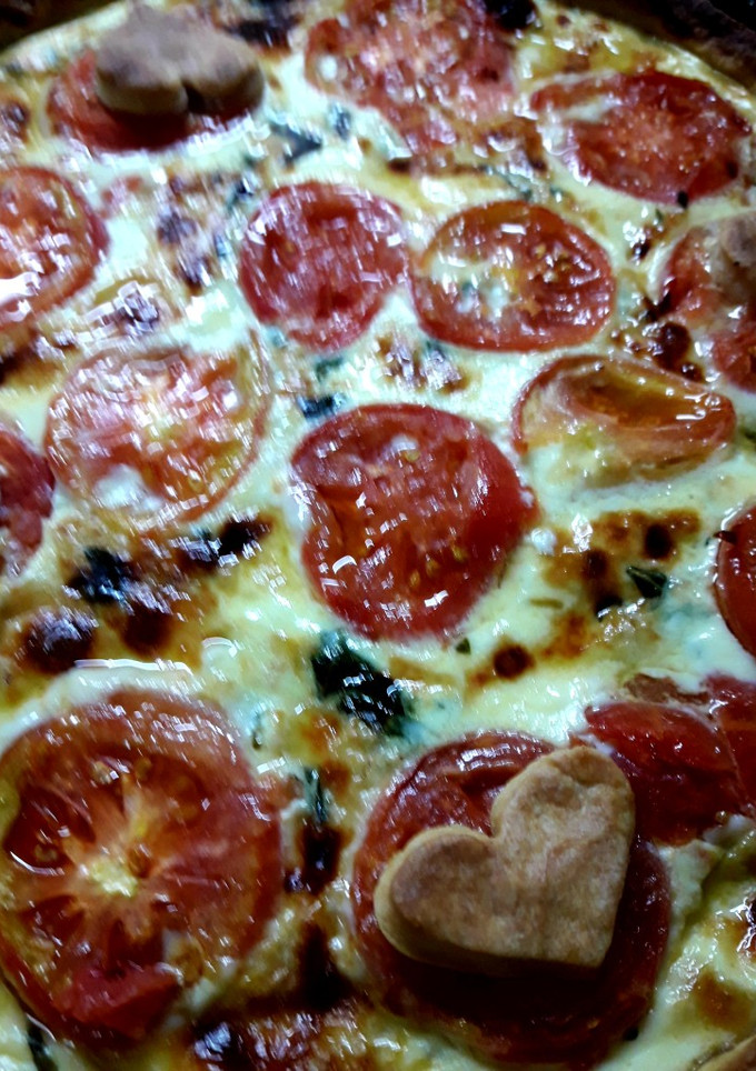 Una foto de Tarta caprese