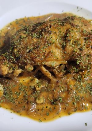 Una foto de Bistec con muslo de pollo