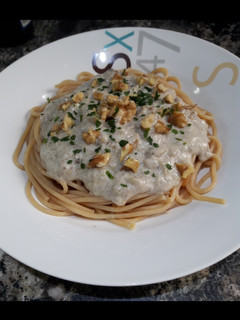 Una foto de Espaguetis integrales con crema de champiñones