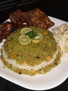 A picture of Fried rice with pepper chicken.