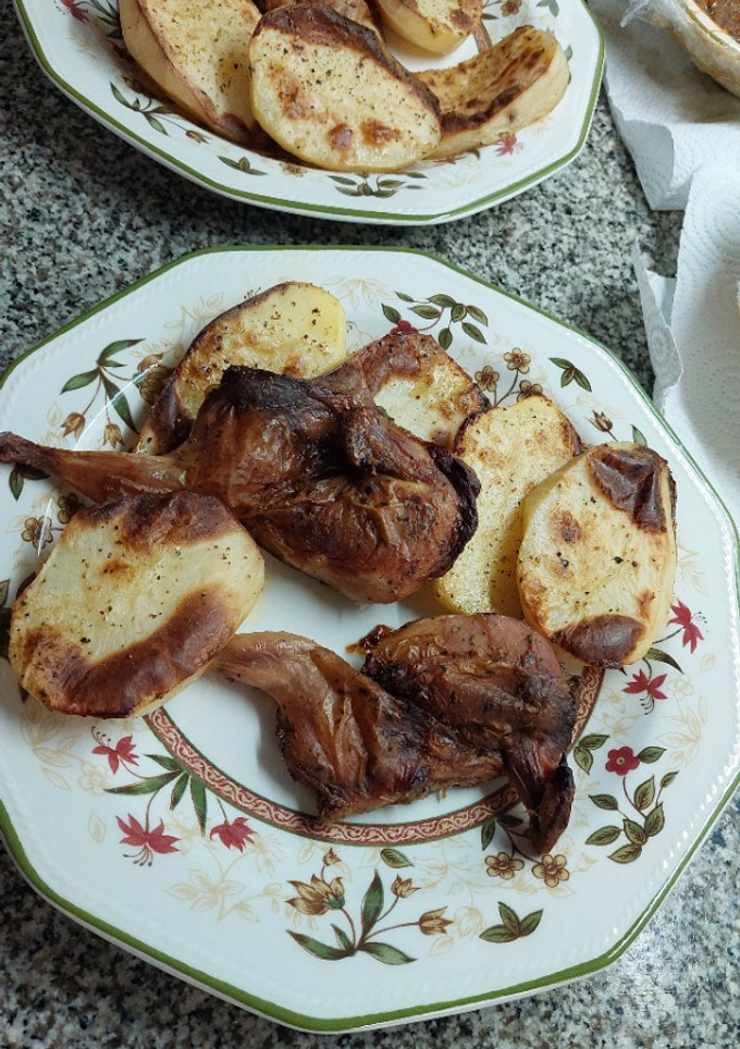 Una foto de Codorniz Marinada al Horno