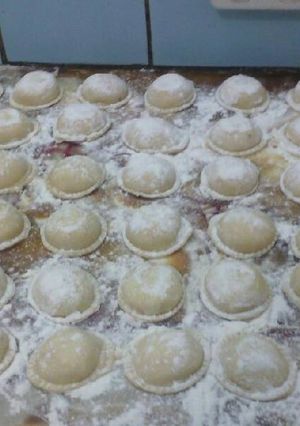 Una foto de Sorrentinos de jamón, ricota y nuez