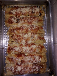 Una foto de Canelones de carne picada
