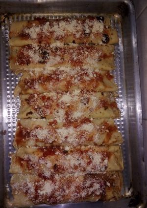 Una foto de Canelones de carne picada