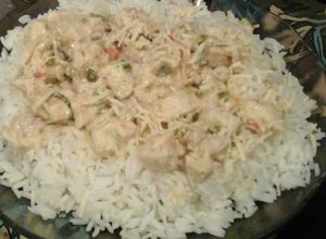 Una foto de Strogonoff de pollo con champiñones