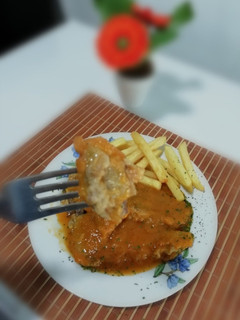 Una foto de Lengua en salsa