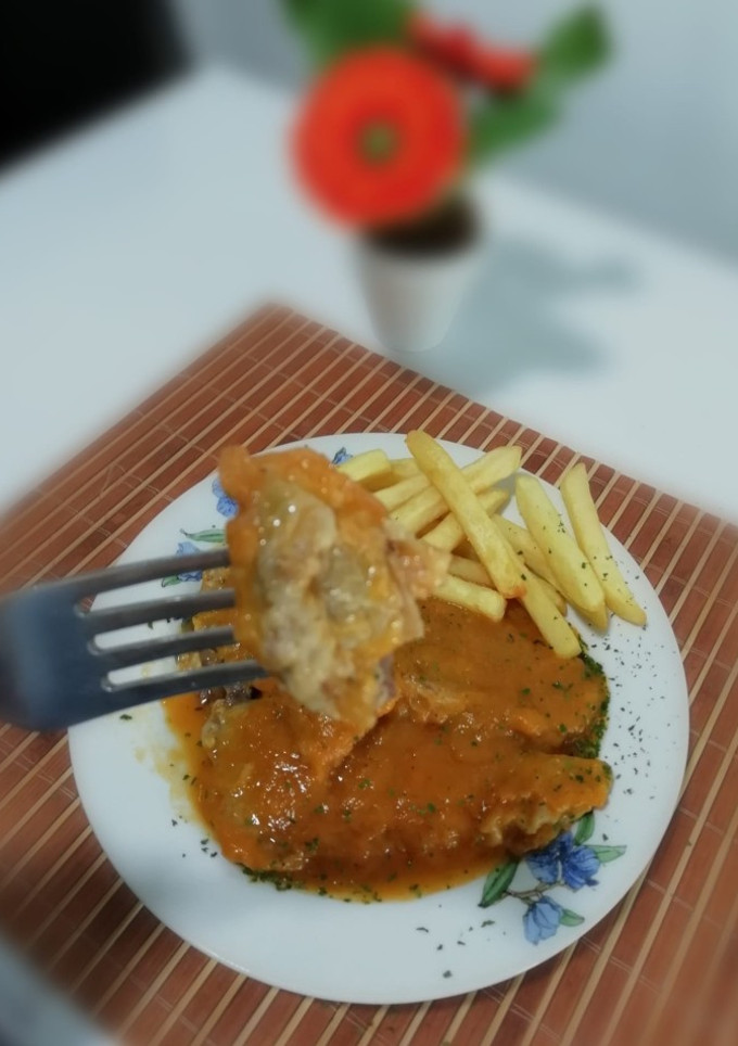 Una foto de Lengua en salsa