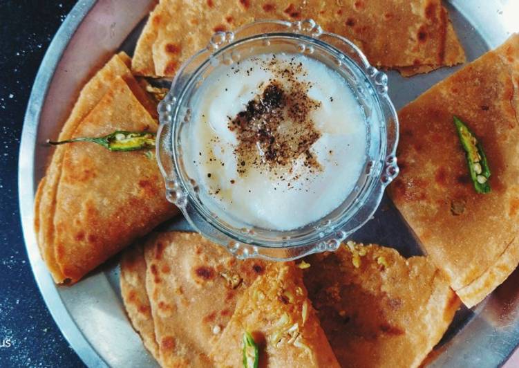 Steps to Make Homemade Gobhi paratha with mitha Dahi