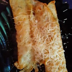 A picture of Zucchini pancakes with cheese.