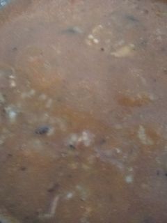 Una foto de Arroz con mejillones y tomate
