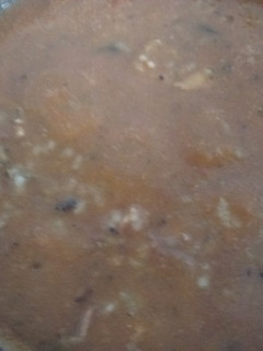 Una foto de Arroz con mejillones y tomate