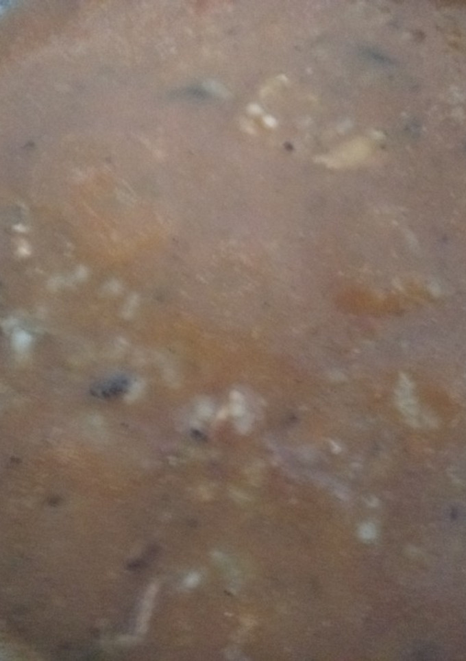Una foto de Arroz con mejillones y tomate