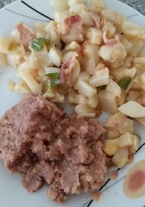 Una foto de Papas con tocino y queso