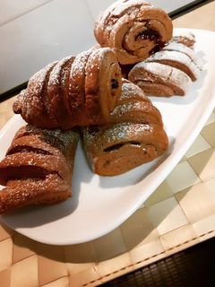 Foto di Saccottini al cacao con marmellata ai frutti di bosco