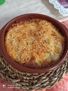 Una foto de Canelones rellenos de atún y tomate