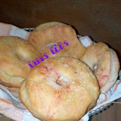A picture of Eggless Baked Colored Doughnut.