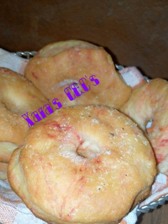 A picture of Eggless Baked Colored Doughnut.