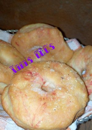 A picture of Eggless Baked Colored Doughnut.