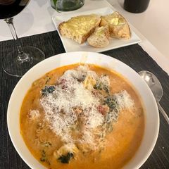 A picture of Creamy Tomato, Tortellini, Sausage and Kale Soup.