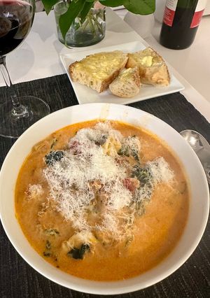 A picture of Creamy Tomato, Tortellini, Sausage and Kale Soup.