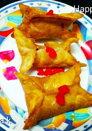 A picture of Momo shaped badam stuffed dry ghujia.