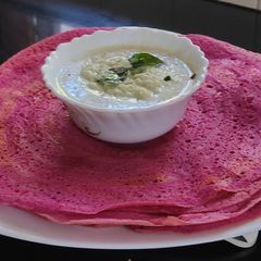 A picture of Beetroot dosa.