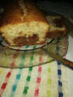 Una foto de Budín de banana 🍌 y dulce de leche