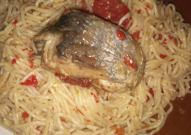 Simple Way to Prepare Award-winning Jollof spaghetti and cooked fish