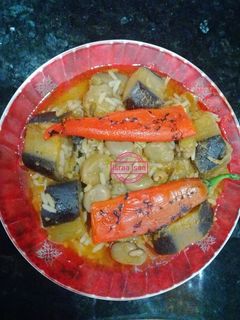 صورة لوصفة تبيخة الفول والباذنجان مع الأرز 🍆🍚🌶