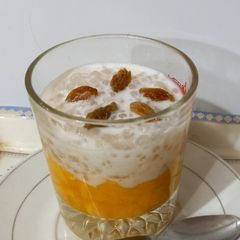 A picture of Mango with sago and raisen 🥭🥭.