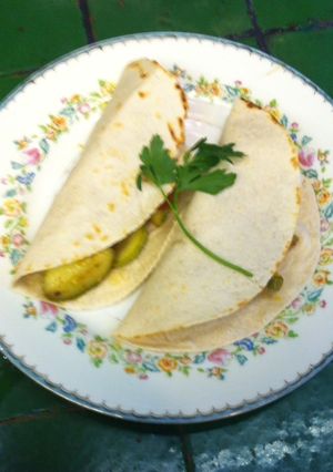 Una foto de Tacos de calabacitas con jitomatitos cherry