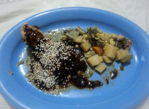Una foto de Huacales rancheros en salsa de zapote prieto y guarnición de milpa las Correa. Jalisco México