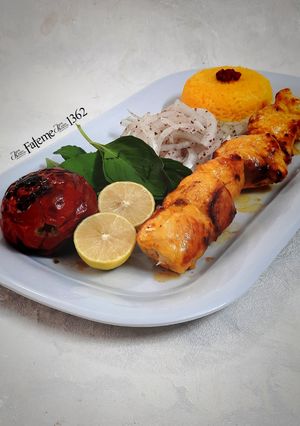A picture of Persian Joojeh Kebab (Saffron Chicken Kebab).