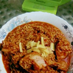 A picture of Mash ke daal chicken.