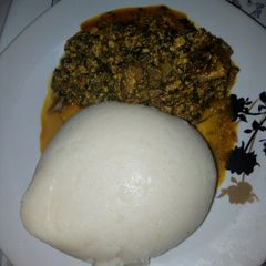 Egusi soup with semo A picture of Egusi soup with semo.