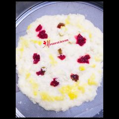 A picture of Microwave giant coconut macaroon with tutti frutti in under 5 minutes.