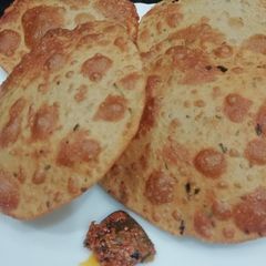 A picture of Crispy Methi Poori.